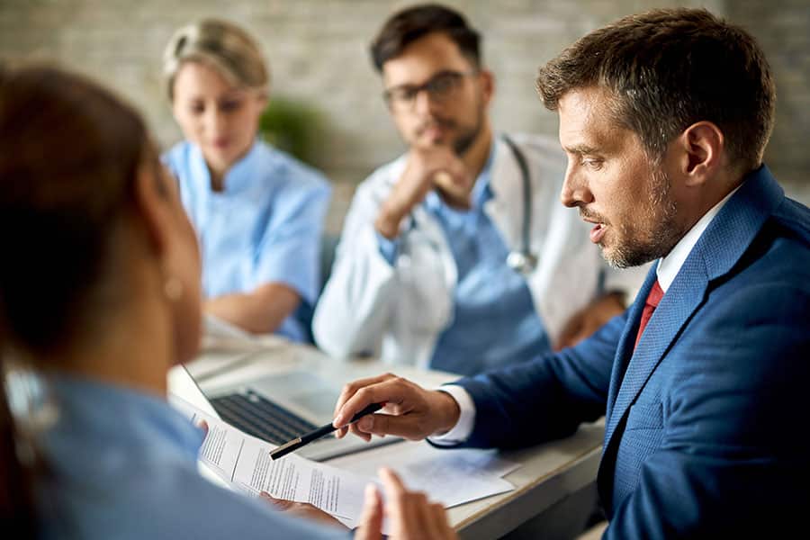 revenue cycle management experts in a meeting